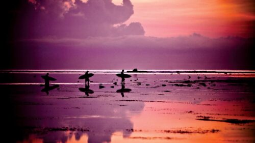 Surfing at Sunset Silhouette Desktop Wallpaper
