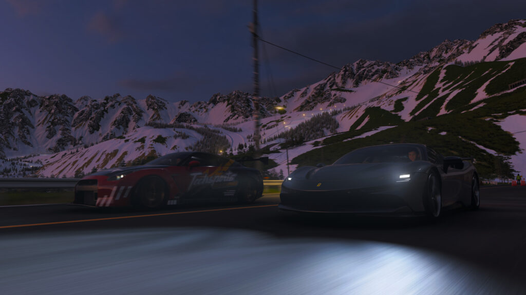 Racing Supercars Through Snowy Mountains Desktop Wallpaper