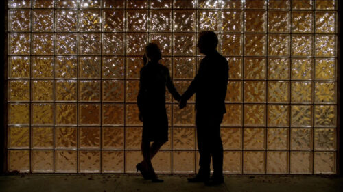 Cinematic Silhouette of Couple Holding Hands Desktop Wallpaper