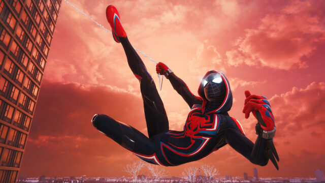 Spider-Man Red Suit Hanging from Web 4K Desktop Wallpaper