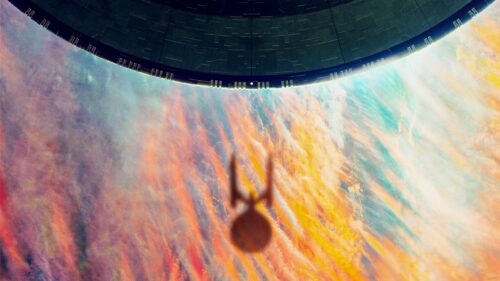 USS Enterprise Orbiting Colorful Planet Desktop Wallpaper