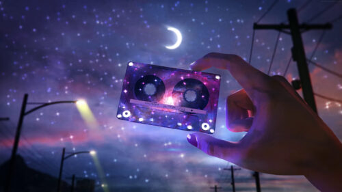 Cosmic Cassette Tape Under a Starry Night Sky Desktop Wallpaper