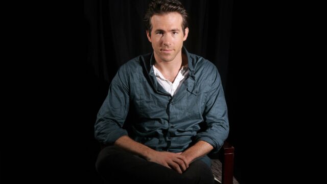 Ryan Reynolds Portrait in Dark Studio Desktop Wallpaper