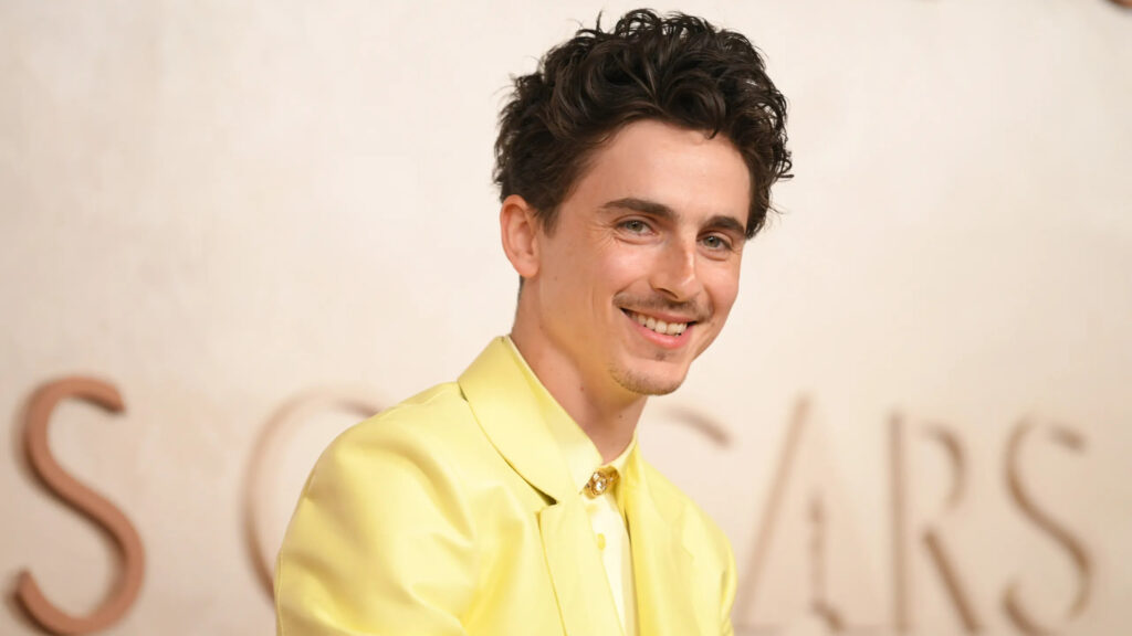 Timothée Chalamet Wearing a Yellow Suit Desktop Wallpaper