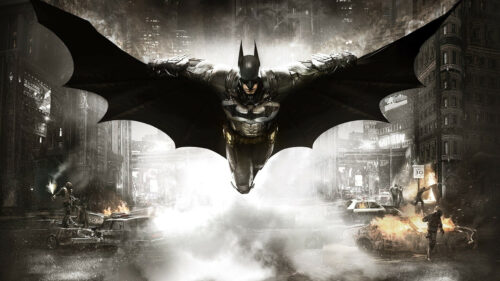 Batman Gliding Over Gotham City 4K Desktop Wallpaper