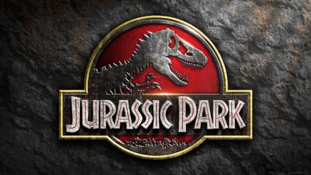 Metallic Jurassic Park Logo Textured Stone 4K Desktop Wallpaper