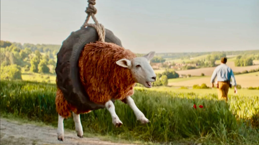 Sheep Playing in a Tire Swing Desktop Wallpaper