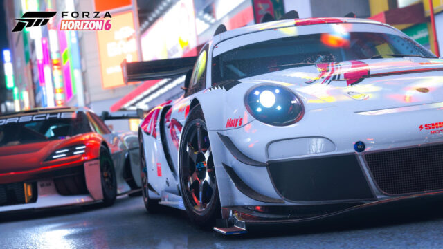 Stunning Porsche Racing Cars Night Street 4K Desktop Wallpaper