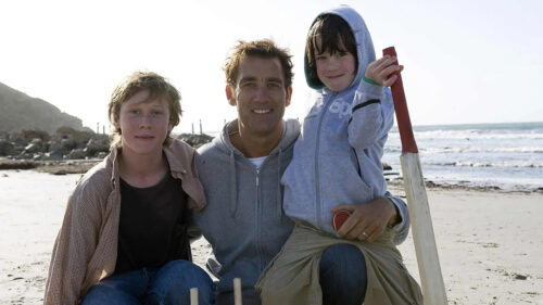 Clive Owen with Children at the Beach 4K Desktop Wallpaper