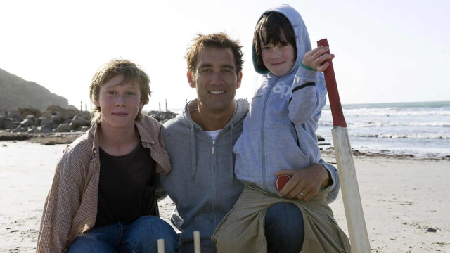 Clive Owen with Children at the Beach 4K Desktop Wallpaper