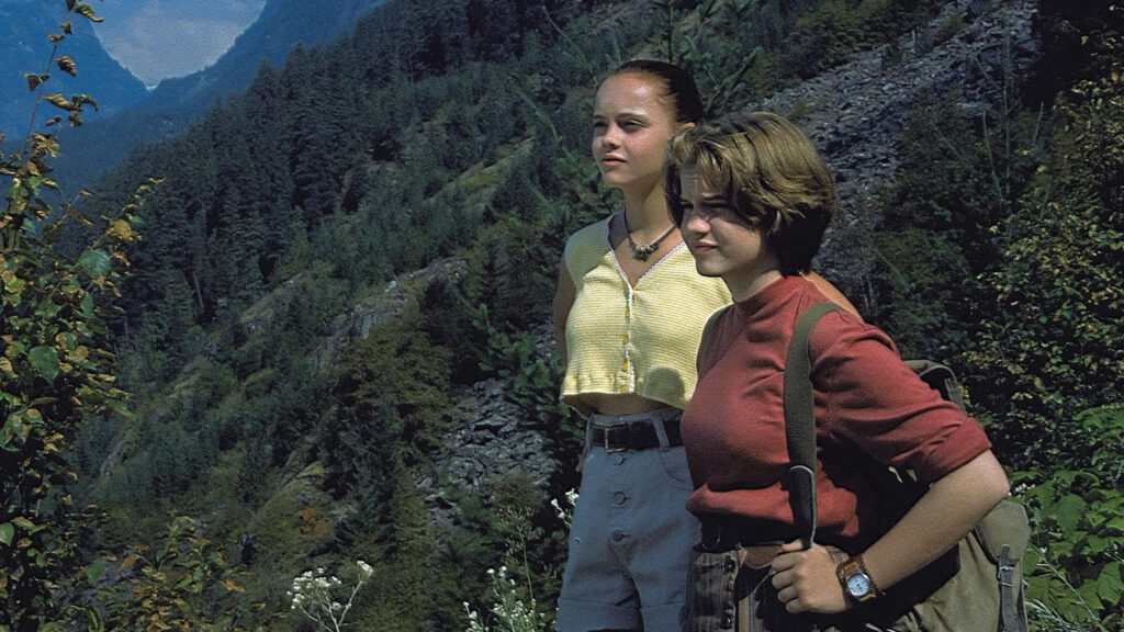 Two Young Women Hiking in the Mountains Desktop Wallpaper