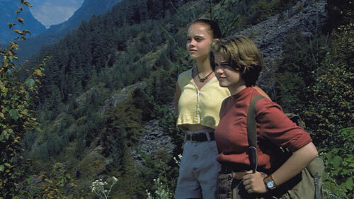 Two Young Women Hiking in the Mountains Desktop Wallpaper