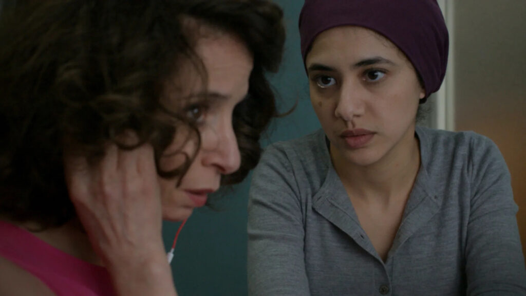 Two Women In Serious Conversation Desktop Wallpaper