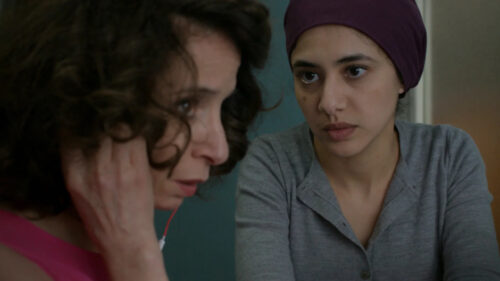 Two Women In Serious Conversation Desktop Wallpaper