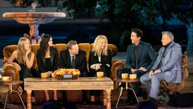 Friends The Reunion Cast on Iconic Orange Sofa Desktop Wallpaper