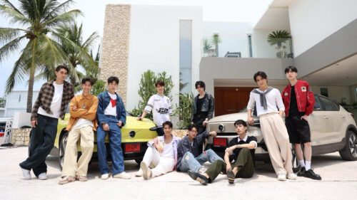 Group of Stylish Young Men Posing with Volvo Cars Desktop Wallpaper