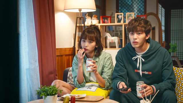Young Couple Watching TV Together Desktop Wallpaper