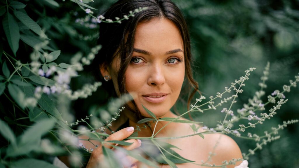 Beautiful Woman Surrounded by Nature Portrait 4K Wallpaper