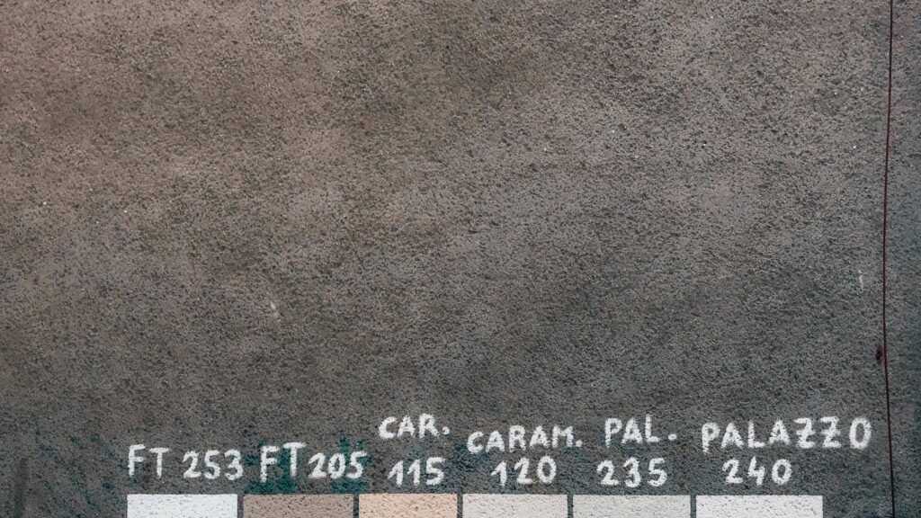 Minimalist Concrete Texture with Color Palette Samples 4K Wallpaper