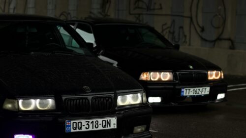 Two Black BMW E36 Sport Cars Parking at Night 4K Desktop Wallpaper