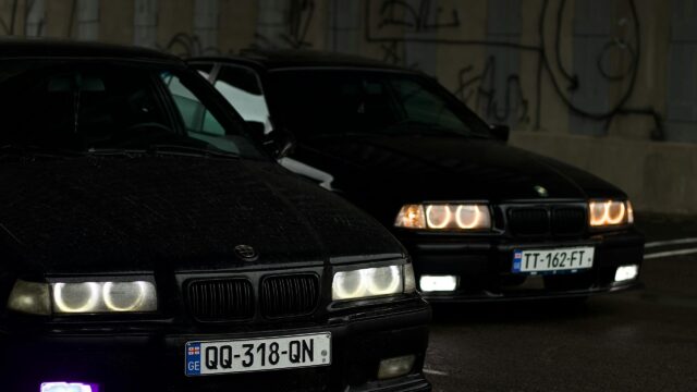 Two Black BMW E36 Sport Cars Parking at Night 4K Desktop Wallpaper