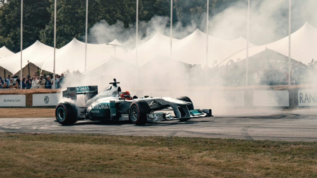 Mercedes Petronas F1 Car Burning Rubber Drift Desktop Wallpaper