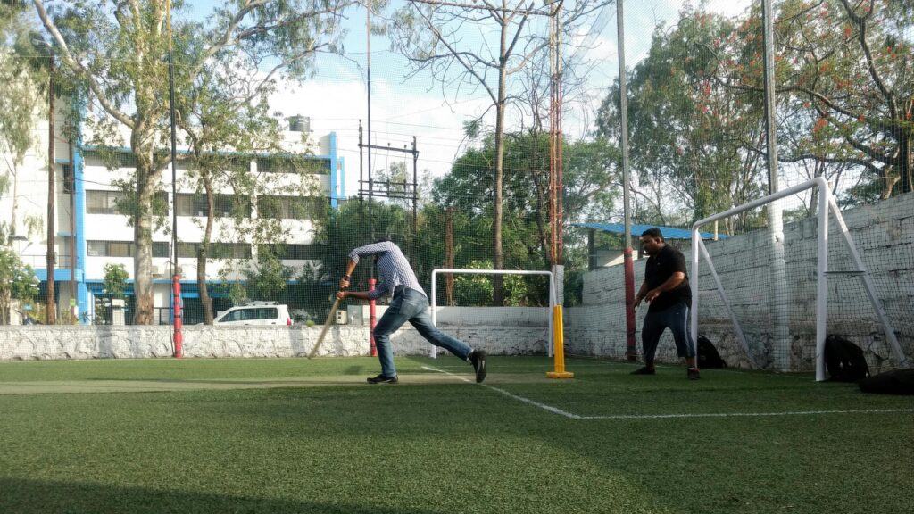 Amateur Cricket Practice Match on Turf Field Desktop Wallpaper