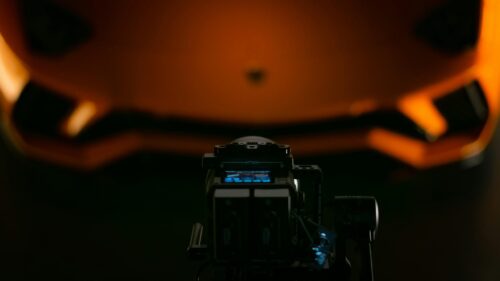 Professional Cinematography of an Orange Lamborghini Supercar 4K Wallpaper