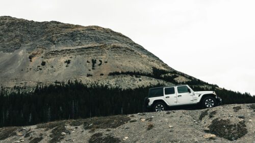 White Jeep Wrangler Sahara Off-Road Mountain Adventure 4K Wallpaper