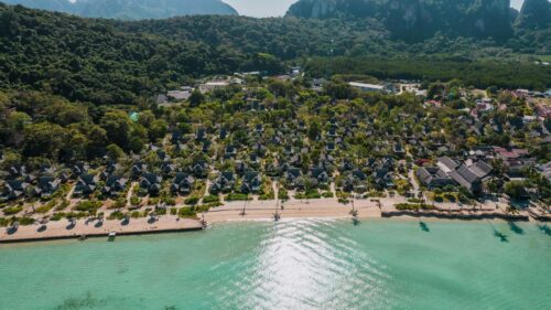 Stunning Aerial View of Tropical Island Resort Beach 4K Wallpaper