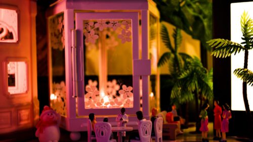 Miniature People Dining in a Magical Lantern Glow Desktop Wallpaper