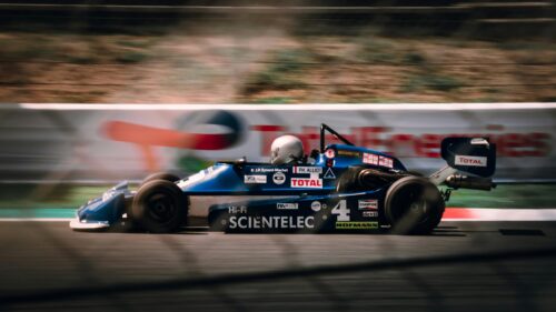 Vintage Martini Racing Formula 3 Car Speeding on Track Desktop Wallpaper
