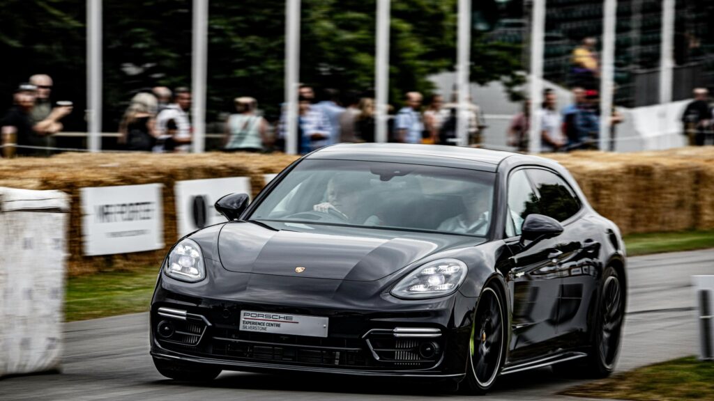 Black Porsche Panamera at Silverstone Circuit 4K Desktop Wallpaper