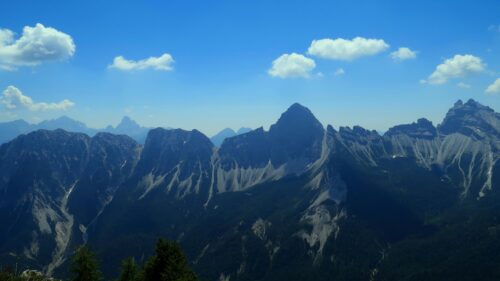 Stunning Dolomite Mountain Peaks Under Blue Sky Desktop Wallpaper