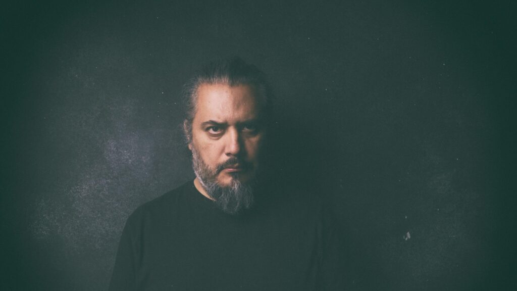 Intense Bearded Man Moody Dark Portrait 4K Desktop Wallpaper