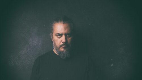 Intense Bearded Man Moody Dark Portrait 4K Desktop Wallpaper