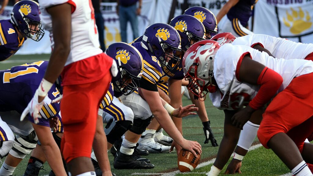 American Football Line of Scrimmage Action 4K Wallpaper