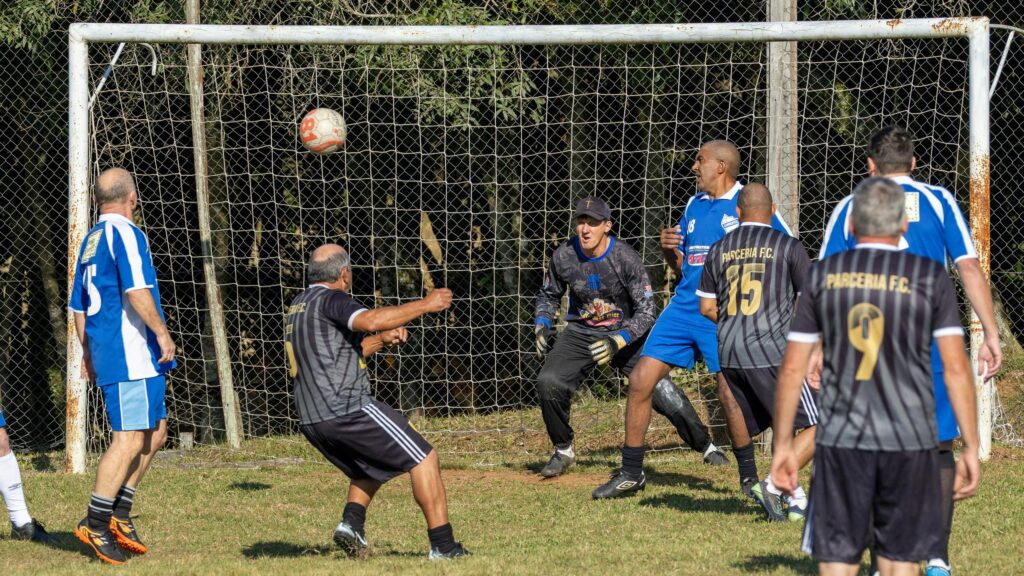 Intense Amateur Soccer Match Action Shot 4K Desktop Wallpaper