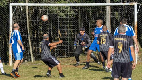 Intense Amateur Soccer Match Action Shot 4K Desktop Wallpaper