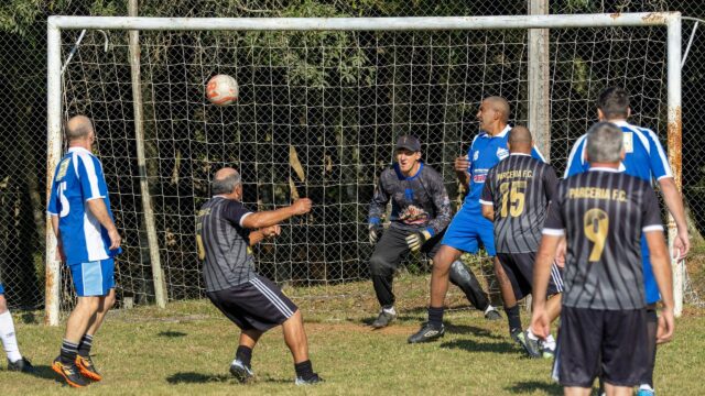 Intense Amateur Soccer Match Action Shot 4K Desktop Wallpaper