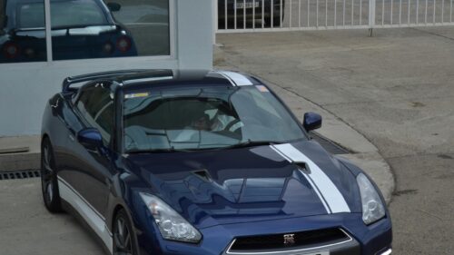 Dark Blue Nissan GT-R R35 with Racing Stripes Desktop Wallpaper