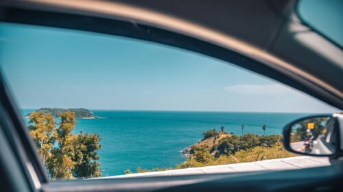 Stunning Coastal Road Trip View From Car Window 4K Wallpaper