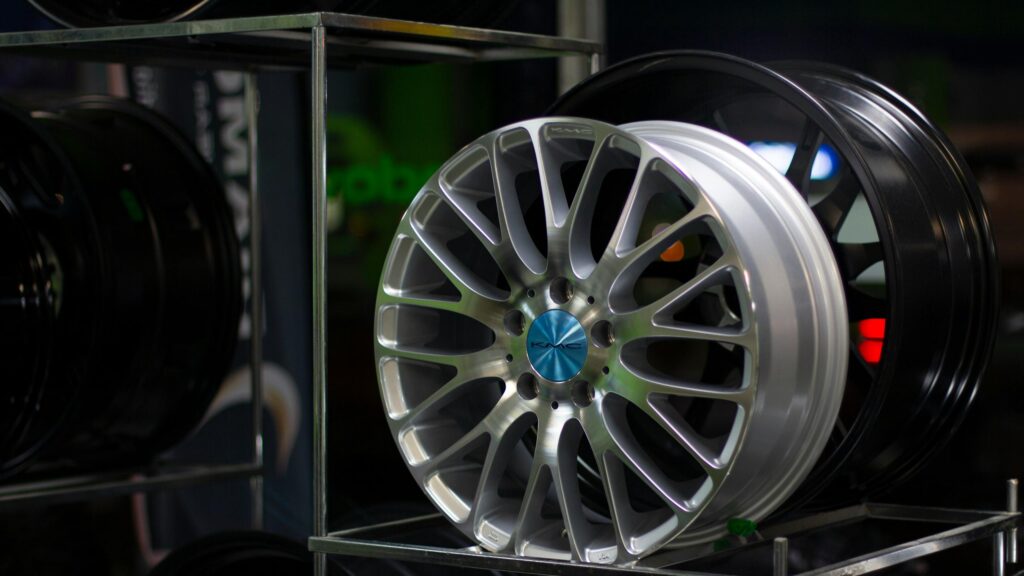 Shiny Silver Alloy Car Wheel Rims Close-Up 4K Wallpaper