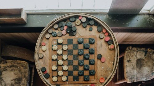 Vintage Checkerboard Game on Wooden Barrel Rustic Desktop Wallpaper