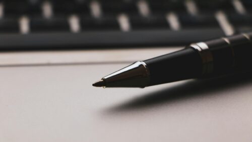 Elegant Black Executive Pen Close-up Professional 4K Desktop Wallpaper