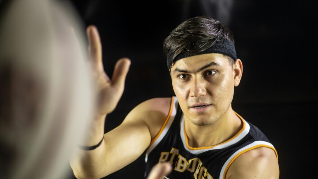 Focused Basketball Player High Five Action 4K Wallpaper