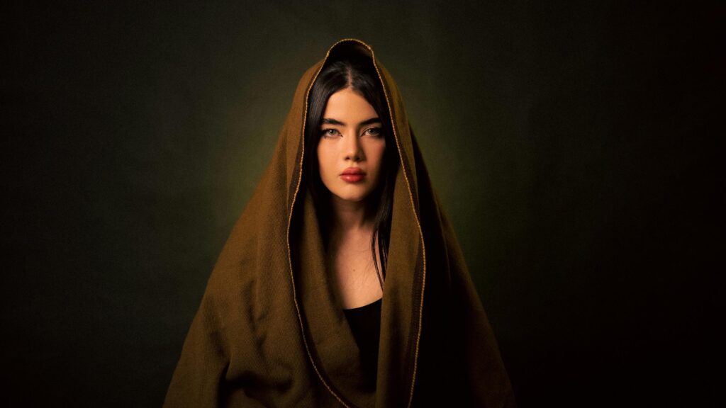 Mysterious Woman in Brown Hood Portrait 4K Desktop Wallpaper