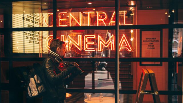Photographer at Central Cinema Neon Sign Desktop Wallpaper