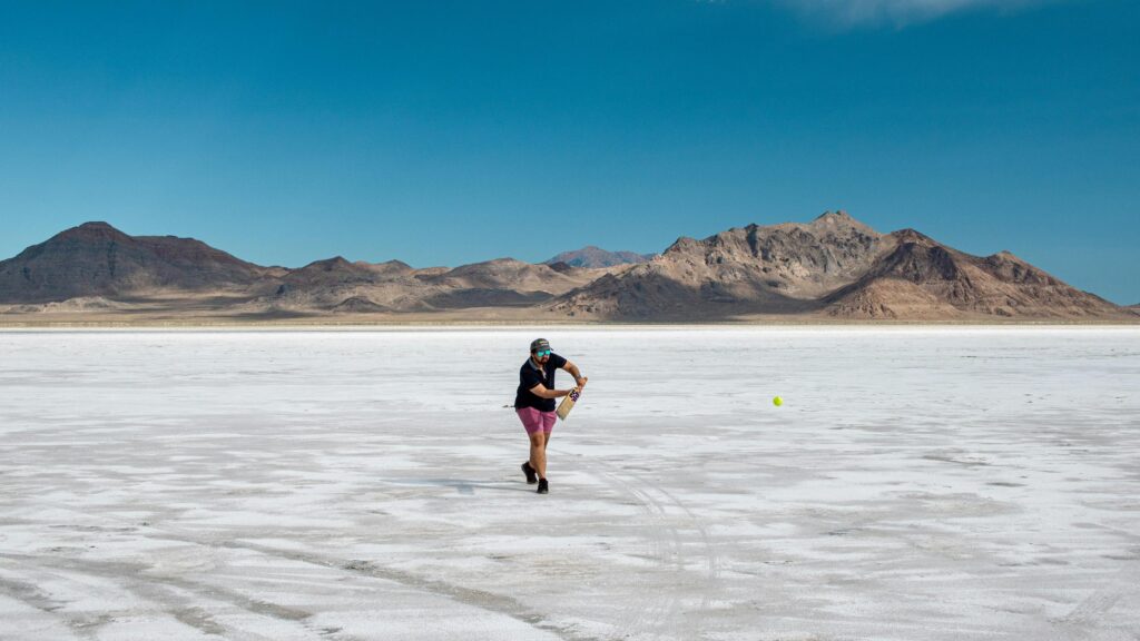 Man Playing Cricket on Bonneville Salt Flats Desktop Wallpaper