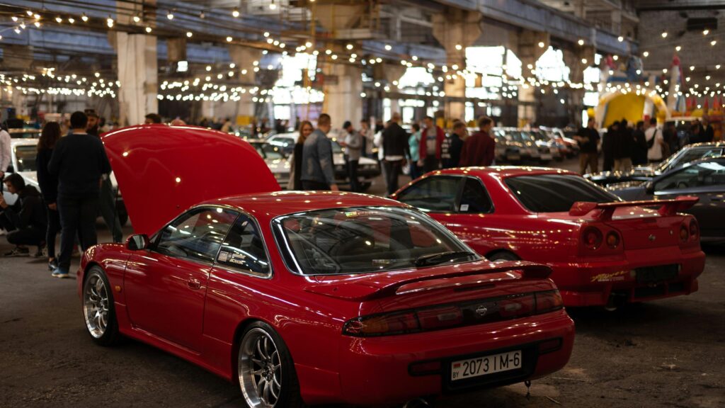 Stunning Red Nissan Silvia S14 and Skyline R34 JDM Car Meet Desktop Wallpaper
